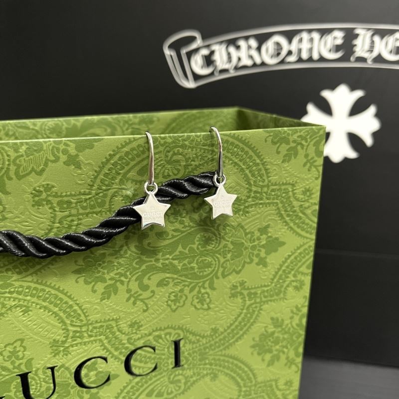 G*u*i earrings